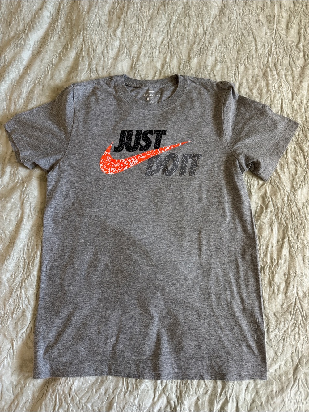 Nike Men’s Gray Tee with Orange Speckled Swoosh